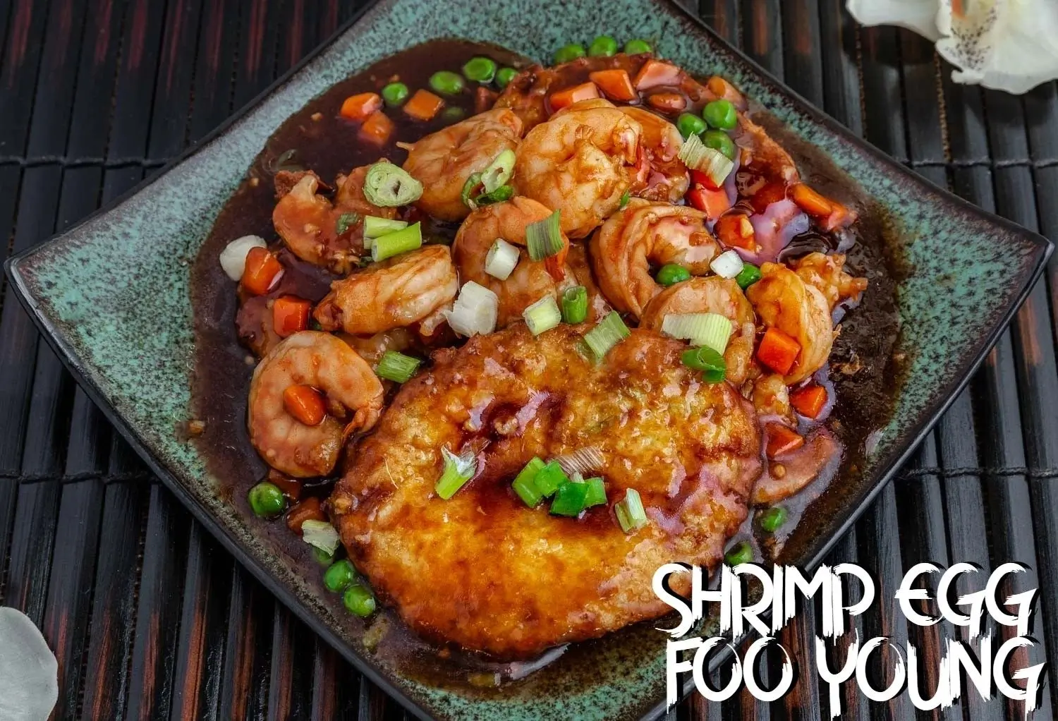 Shrimp Egg Foo Young - Egg foo young with shrimp and veggies in savory sauce at Chef Panda, a Chinese restaurant in Surprise